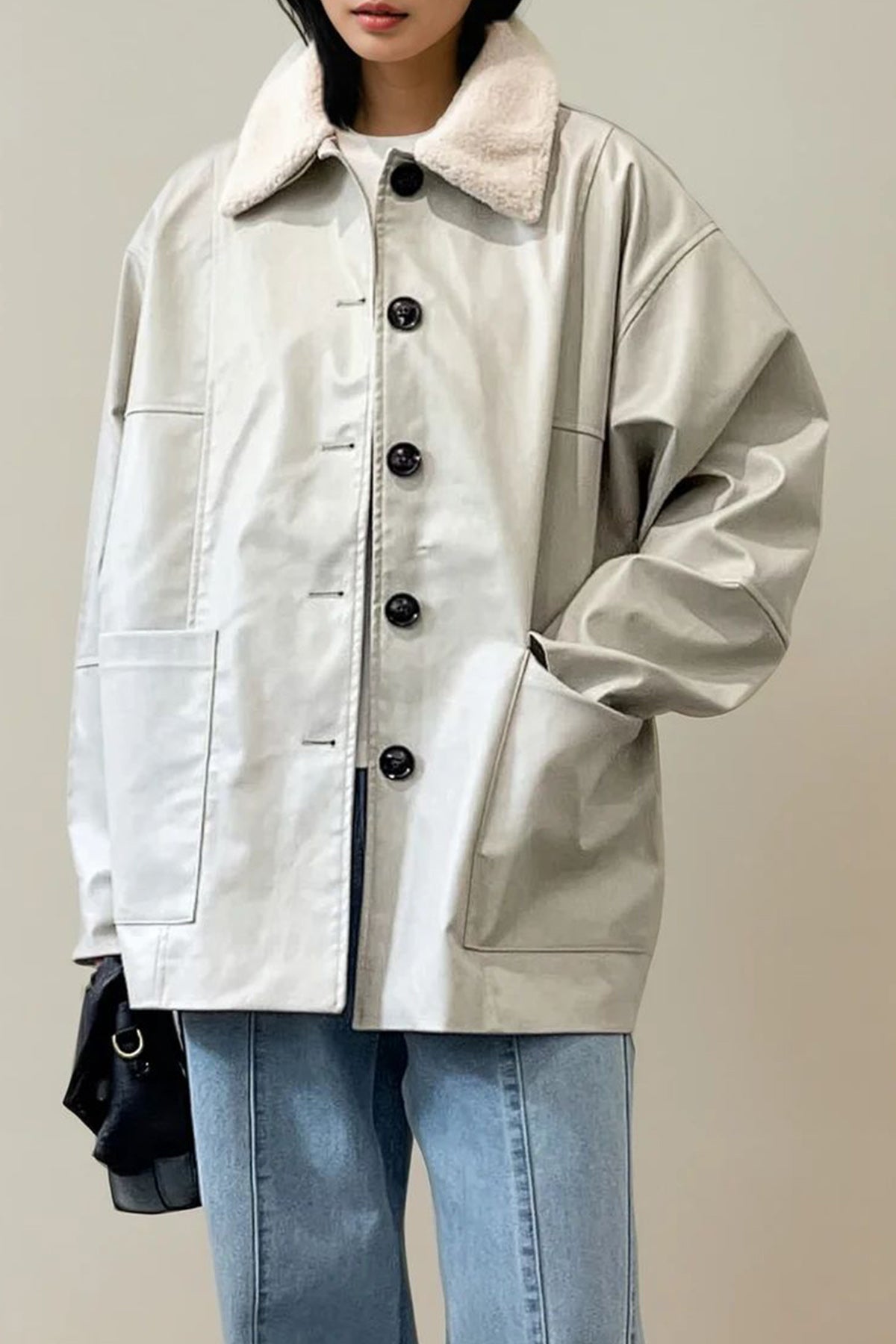 Model wearing short coat