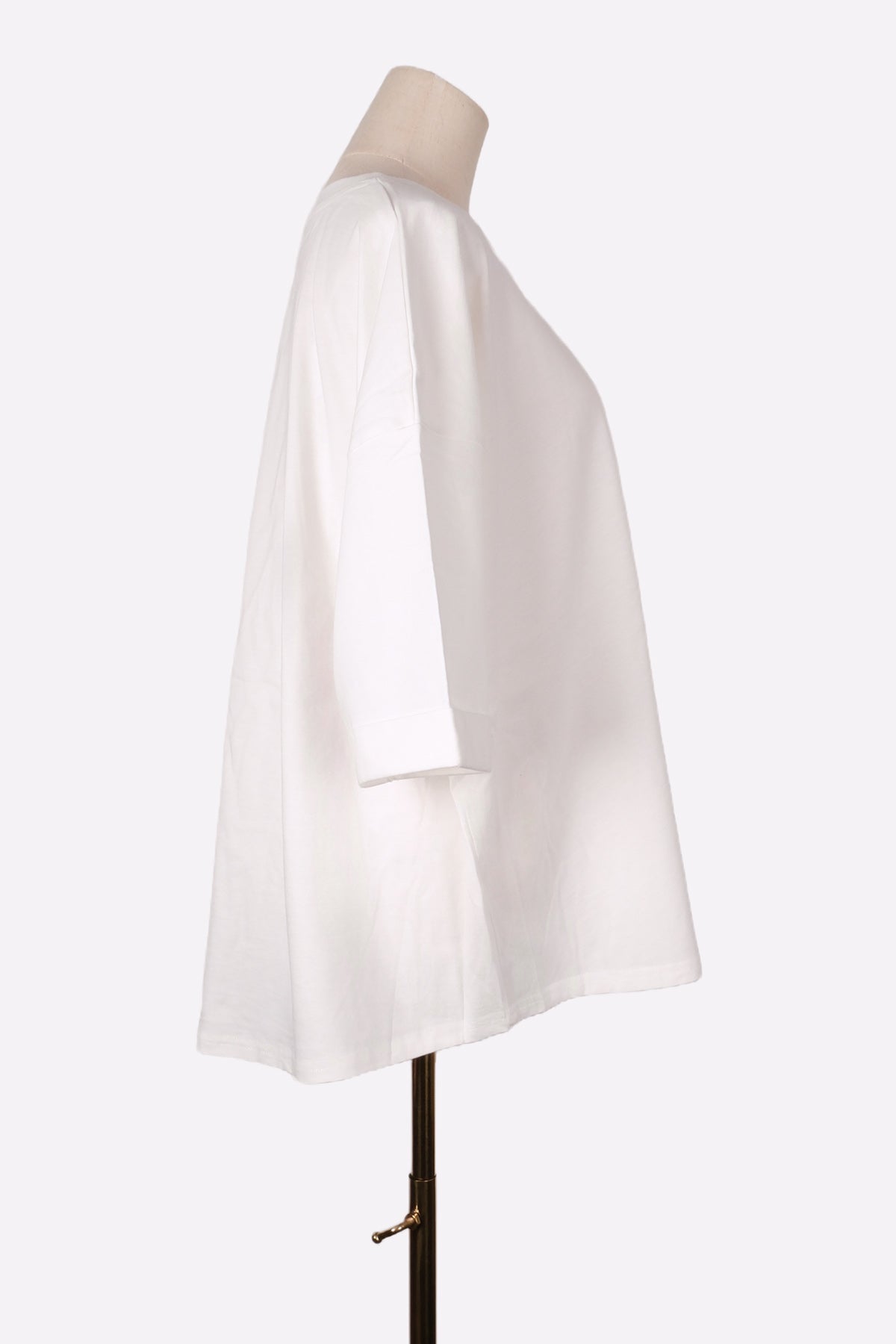 White T-shirt on a mannequin against a white background